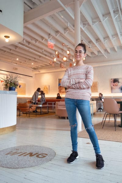 Audrey Gelman stands in the lobby of The Wing SOHO | © Phil Provencio/Unearth Women