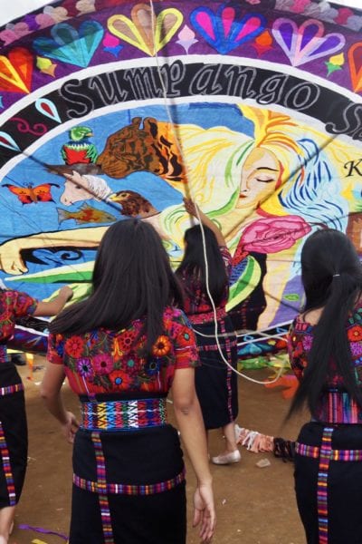 The Orquideas Oficial get ready to fly their handmade kite at Guatemala's kite festival in Sumpango | © Nikki Vargas/Unearth Women