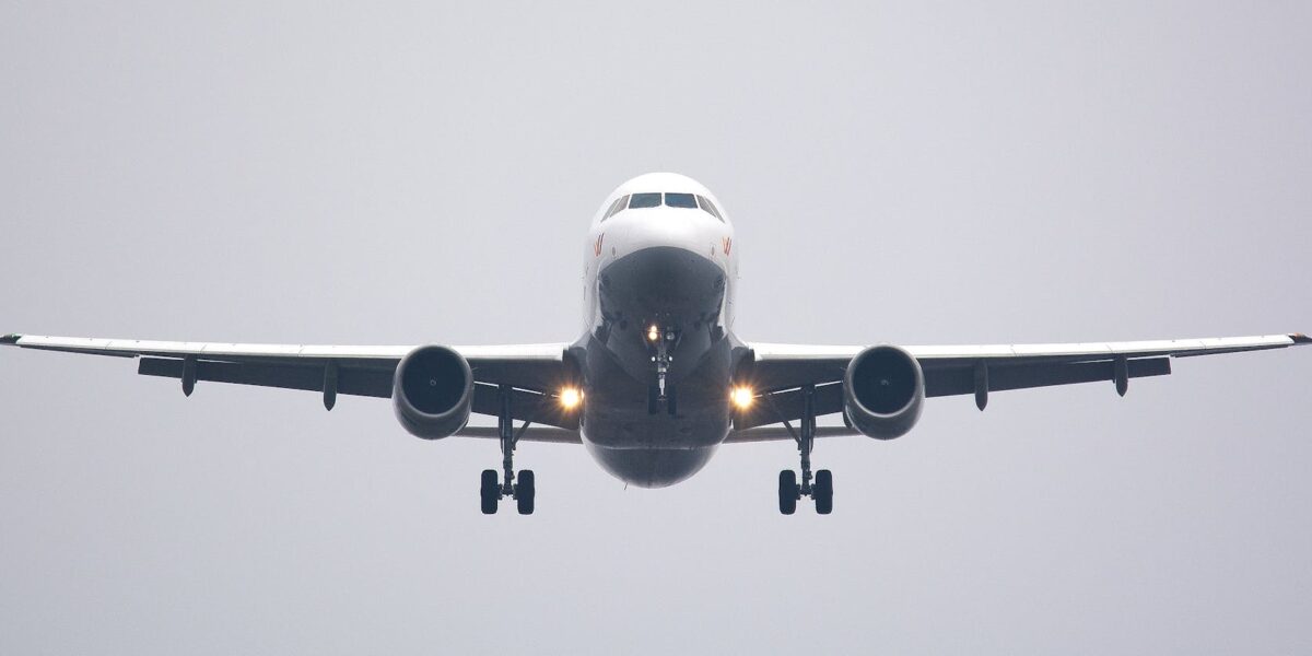 time lapse photography of white commercial airplane