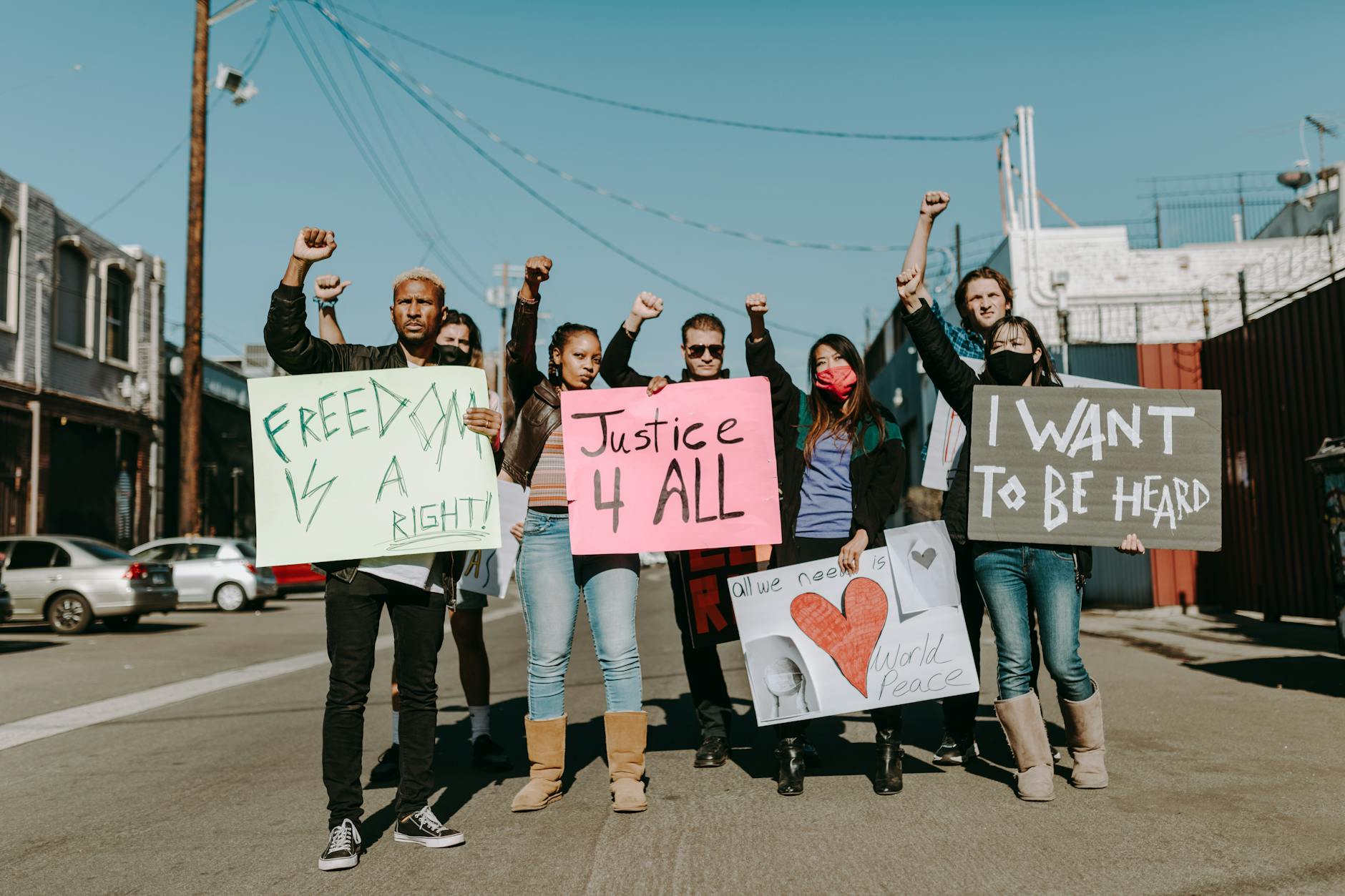 a people holding placard protesting together